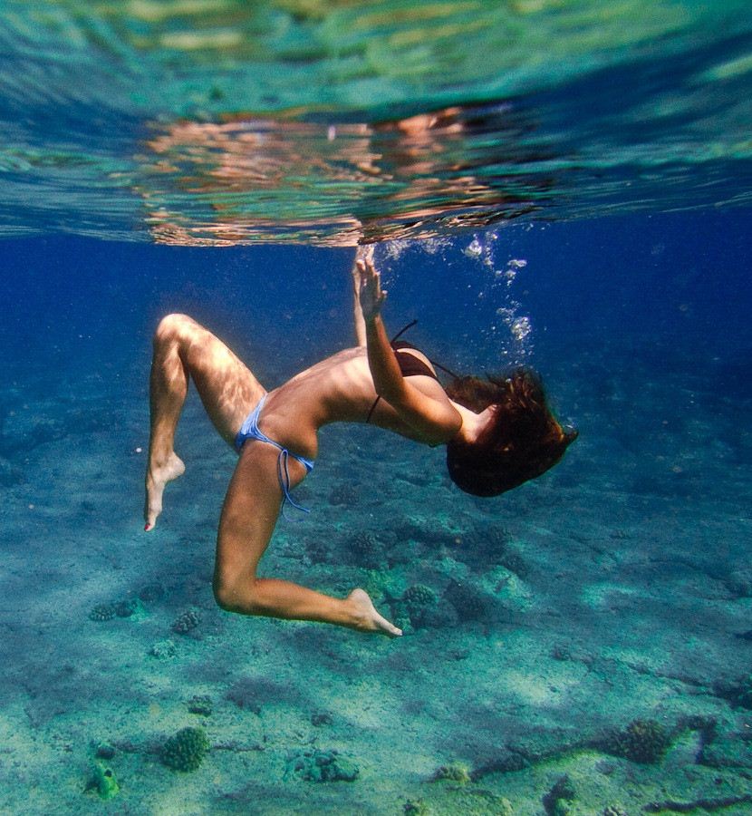 Ebony mermaid practicing underwater bikini